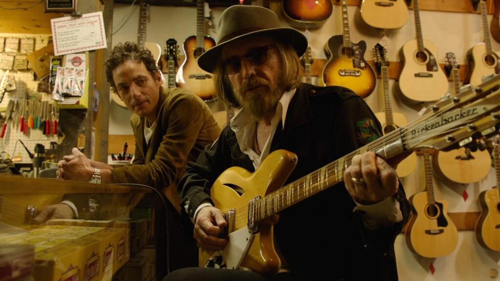Jakob Dylan and the late Tom Petty in 'Echo in the Canyon.' The documentary revisits the 1960s music scene in Los Angeles's Laurel Canyon neighborhood, where a singular collection of musicians from all over - drawn by a combination of hilly seclusion and proximity to Hollywood recording studios - fostered an era-defining vibe of collaboration, freedom and poetic inspiration. (Greenwich Entertainment)