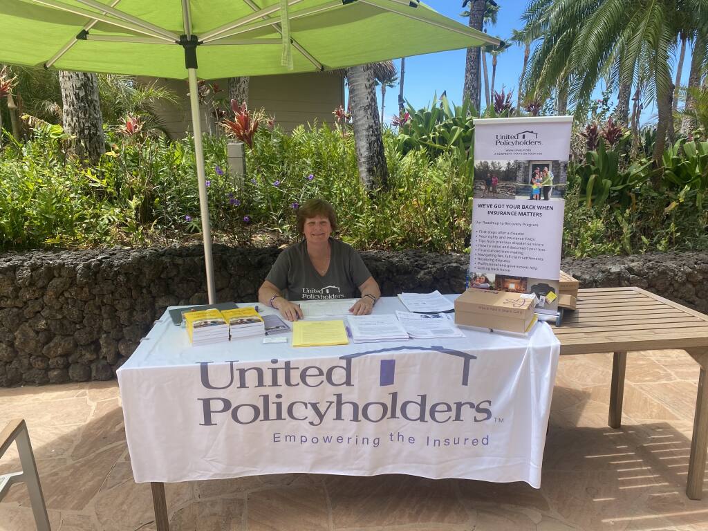 Annie Barbour, a Tubbs Fire survivor, is working the United Policyholders table on Maui, Sunday, Aug. 13, 2023. (Courtesy photo)