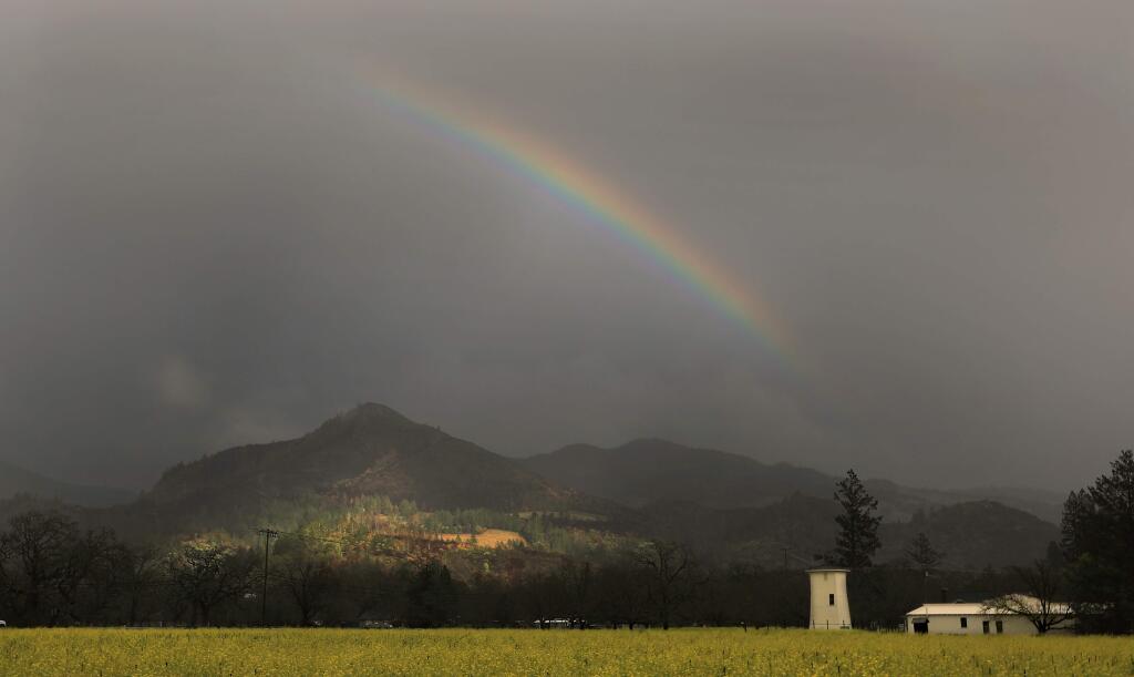 in Kenwood, a rainbow makes a brief appearance as a winter storm rolls through Sonoma County, Thursday March 1, 2018. (Kent Porter / Press Democrat) 2018