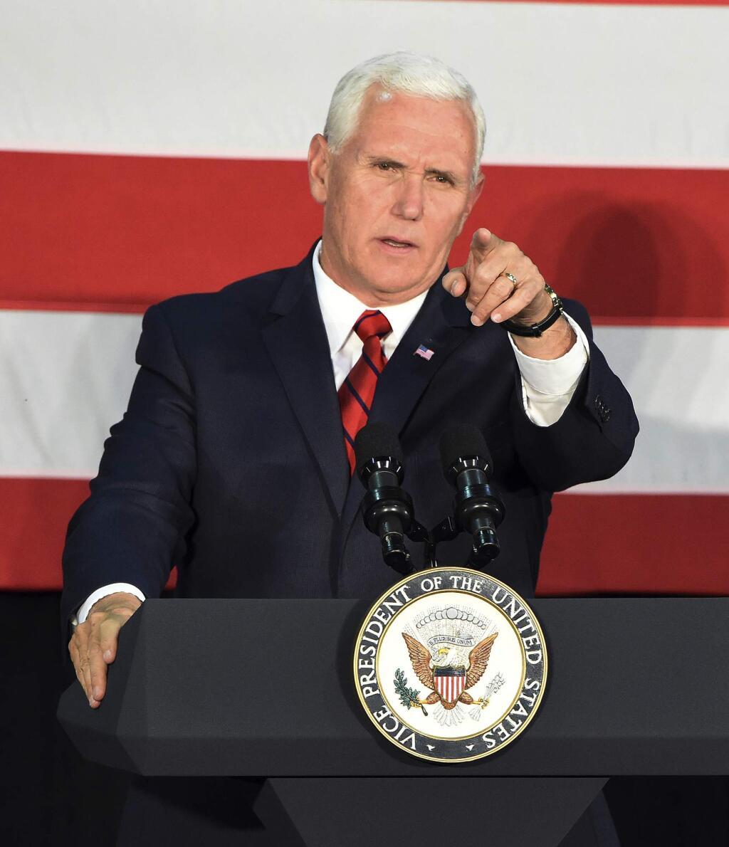 Vice President Mike Pence makes a campaign stop to support Sen. Luther Strange in Birmingham, Ala., Monday, Sept. 25, 2017. President Donald Trump called an Alabama radio show Monday to urge support for Strange in Tuesday's runoff for the GOP nomination, and Pence campaigned for Strange in Birmingham while Trump's former strategist, Steve Bannon, spoke at a Roy Moore rally at the coast. (Joe Songer/AL.com via AP)