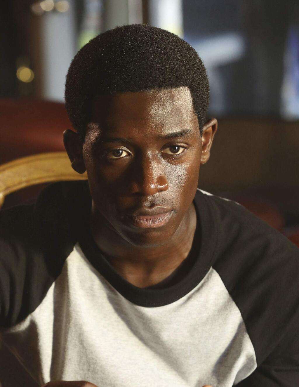 This image provided by FX shows Damson Idris who stars as Franklin Saint on the FX's new series “Snowfall.” which focuses on the genesis of how crack cocaine became a rampant epidemic in Los Angeles' inner city neighborhoods in 1983. The first season premieres Wednesday, July 5, 2017. (Michael Yarish/FX via AP)