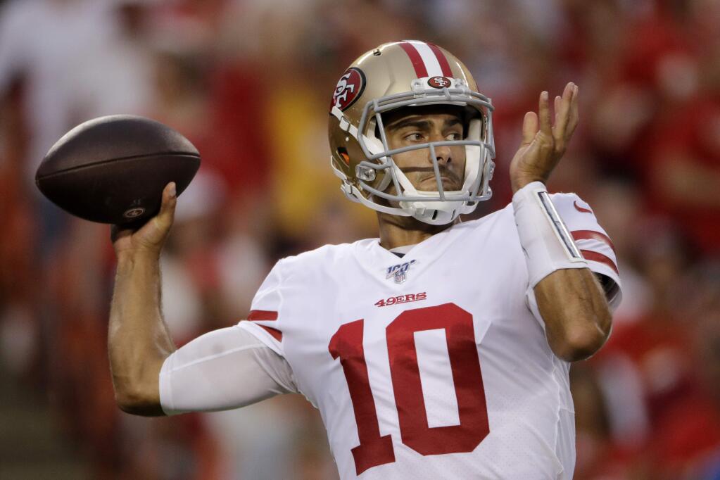 In this Aug. 24, 2019, file photo, San Francisco 49ers quarterback Jimmy Garoppolo throws a pass during the first half of a preseason game against the Kansas City Chiefs, in Kansas City, Mo. (AP Photo/Charlie Riedel, File)