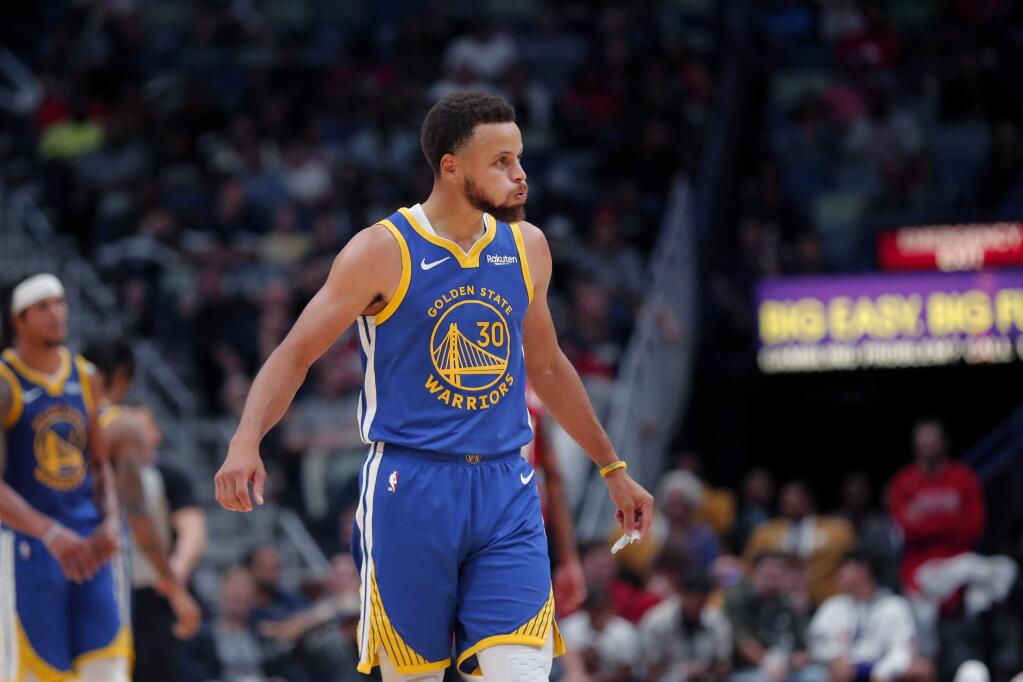 Golden State Warriors guard Stephen Curry reacts after being called for a foul in the second half of against the New Orleans Pelicans in New Orleans, Monday, Oct. 28, 2019. (AP Photo/Gerald Herbert)