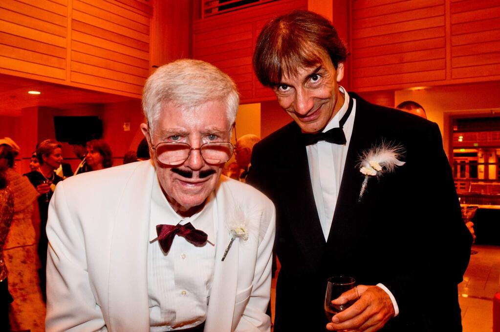 A mustachioed Donald Green (left) and Bruno Ferrandis attend 'A Roaring Good Time,' 1920's-themed party and season opening fundraiser for Santa Rosa Symphony's 85th anniversary, on October 4, 2012 held at SSU's Green Music Center. (Photo by Alvin Jornada for The Press Democrat)