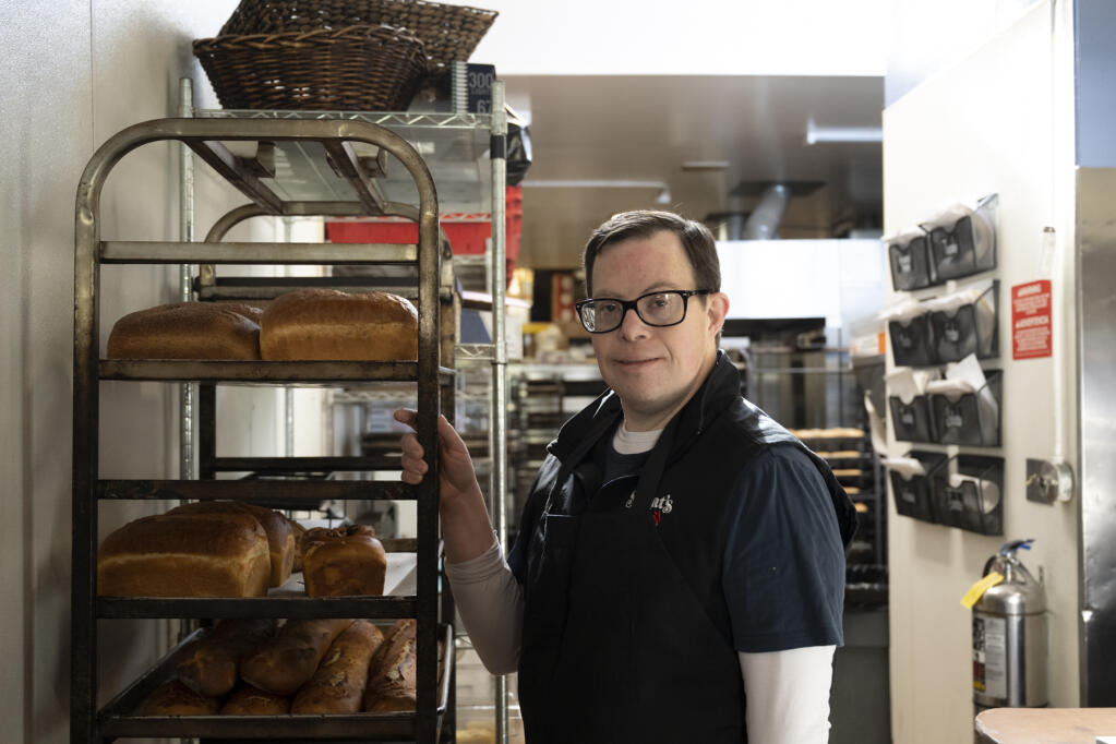 Richie Henderson pauses at in the kitchen at Schat’s Bakeries and Cafe in Ukiah. Henderson has worked at Schat’s downtown location near the Ukiah courthouse for 20 years. (Jendi Coursey)