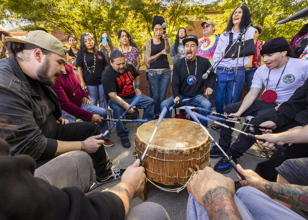 The Native Resistance Drum Group play a traditional drum that represents the “heartbeat of Mother Earth” at the SRJC Indigenous Peoples Day celebration October 10, 2022. (John Burgess/The Press Democrat)