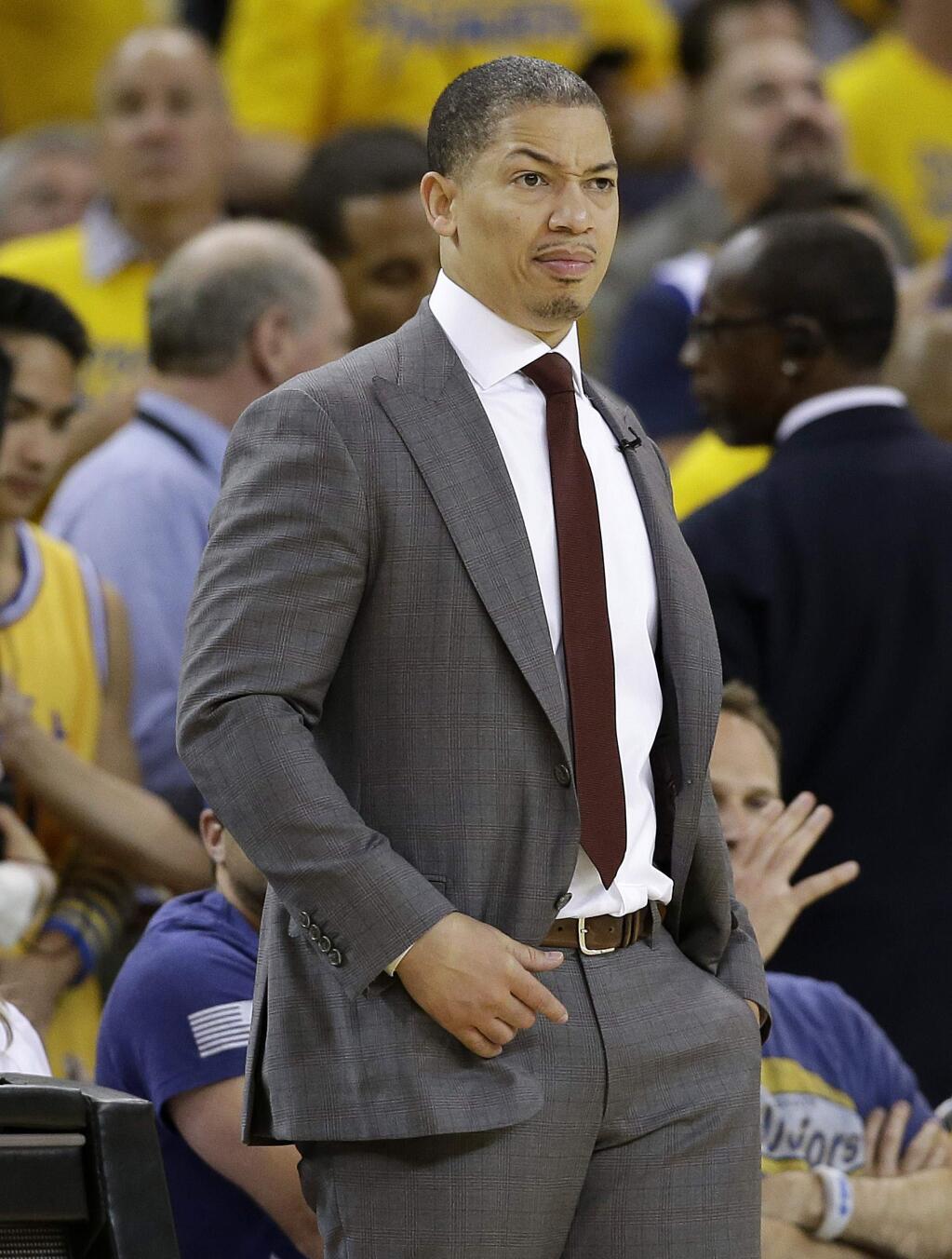 Cleveland Cavaliers head coach Tyronn Lue watches during the second half of Game 1 of basketballs NBA Finals between the Golden State Warriors and the Cavaliers in Oakland, Calif., Thursday, June 2, 2016. (AP Photo/Marcio Jose Sanchez)