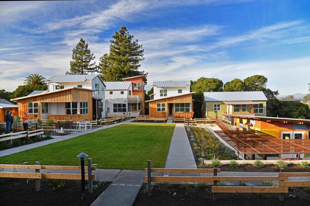 A cluster of eight single-family homes surrounds a common courtyard at Keller Court Commons, completed in Petaluma in 2018. (SCOTT HESS / FOR MAD ARCHITECTURE)