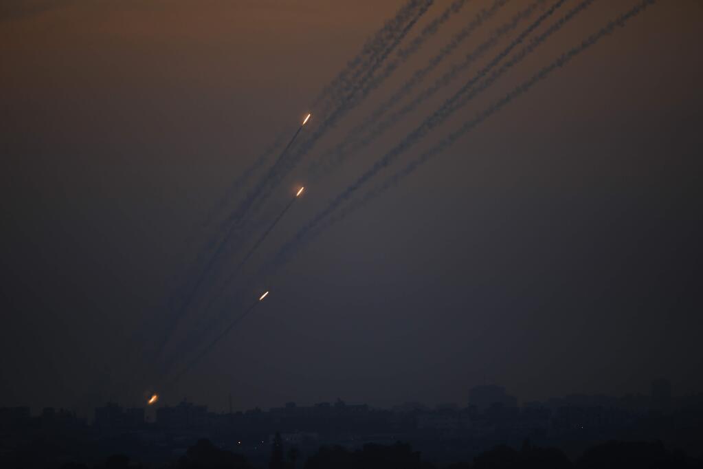Rockets are launched from Gaza Strip to Israel, Sunday, May 5, 2019. Palestinian militants in the Gaza Strip on Sunday intensified a wave of rocket fire into southern Israel, striking towns and cities across the region while Israeli forces struck dozens of targets throughout Gaza, including militant sites that it said were concealed in homes or residential areas. (AP Photo/Ariel Schalit)
