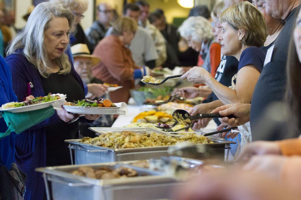 The Sonoma Community Center hosted its annual free Thanksgiving Day Dinner at the Sonoma Valley Veterans Memorial Hall. Local businesses, service clubs and volunteers came together to provide the support needed to feed nearly 500 people. (Photo by Robbi Pengelly/Index-Tribune)