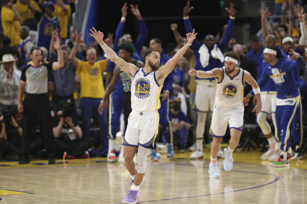 Warriors guards Stephen Curry and Klay Thompson during Game 5 of the NBA Finals against the Boston Celtics in San Francisco. (Jed Jacobsohn / ASSOCIATED PRESS)