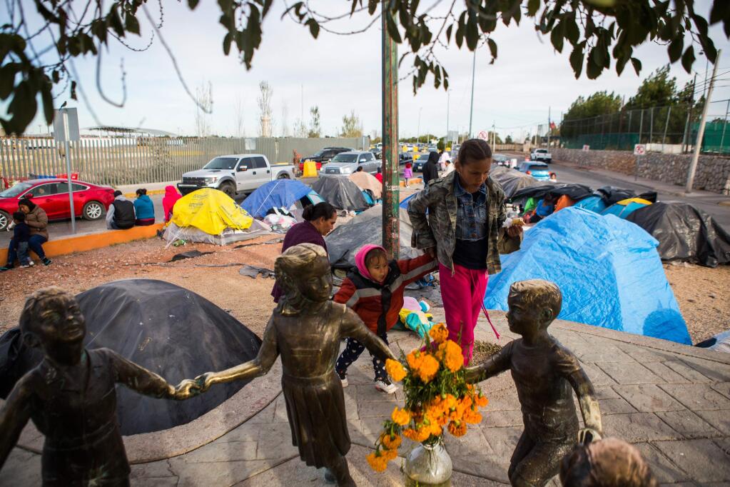 A migrant encampment in Ciudad Juarez, Mexico, Nov. 2, 2019. Mexicans have been showing up in border cities in greater numbers, in many cases fleeing the country's escalating violence and ending up stuck in encampments, unable to apply for asylum due to restrictive measures implemented by the Trump administration. (Celia Talbot Tobin/The New York Times)