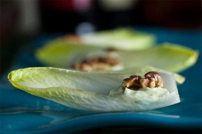 Nourish EvolutionEndive Spears with Roquefort Mousse and Walnuts from Lia Huber of The Nourish Evolution.