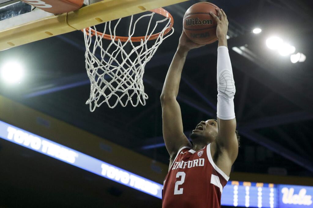 Stanford guard Bryce Wills dunks against UCLA during the first half in Los Angeles, Wednesday, Jan. 15, 2020. (AP Photo/Chris Carlson)