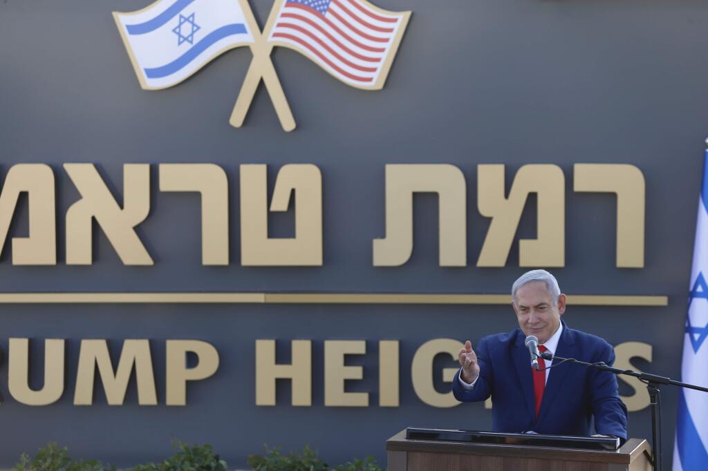 Israeli Prime Minister Benjamin Netanyahu speaks during the inauguration of a new settlement named after President Donald Trump in Golan Heights, Sunday, June 16, 2019. The Trump name graces apartment towers, hotels and golf courses. Now it is the namesake of a tiny Jewish settlement in the Israeli-controlled Golan Heights. (AP Photo/Ariel Schalit)