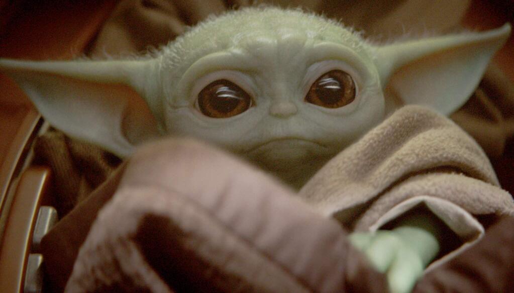 Baby Yoda is known simply as 'the Child' in 'The Mandalorian,' the first live-action 'Star Wars' series. (DISNEY PLUS)
