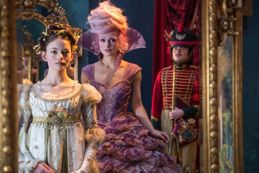 Walt Disney Pictures Mackenzie Foy, left, as Clara and Keira Knightley as Sugar Plum Fairy in 'The Nutcracker and the Four Realms' about Claras search for a a one-of-a-kind key that will unlock a box that holds a priceless gift from her late mother.