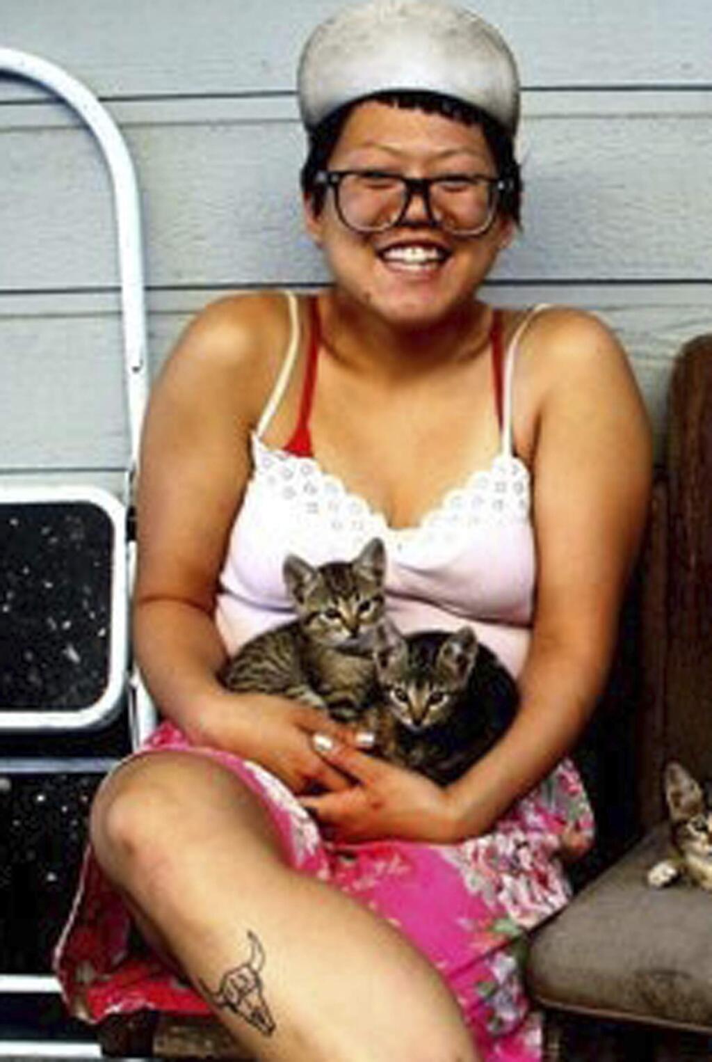 This 2012 photo provided by Terry Ewing shows Ara Jo in New Orleans. Friends called Jo the most adoptable person ever, a vibrant artist and community organizer who could make friends with anyone, anywhere. Jo, 29, grew up in Los Angeles and was living in Oakland. Authorities notified her family, including her parents who flew in in from South Korea, of her death on Monday, Dec. 5, 2016. Jo was one of dozens of people killed in the fire at the Ghost Ship warehouse fire in Oakland, Calif., that started Dec. 2, 2016. (Terry Ewing via AP)