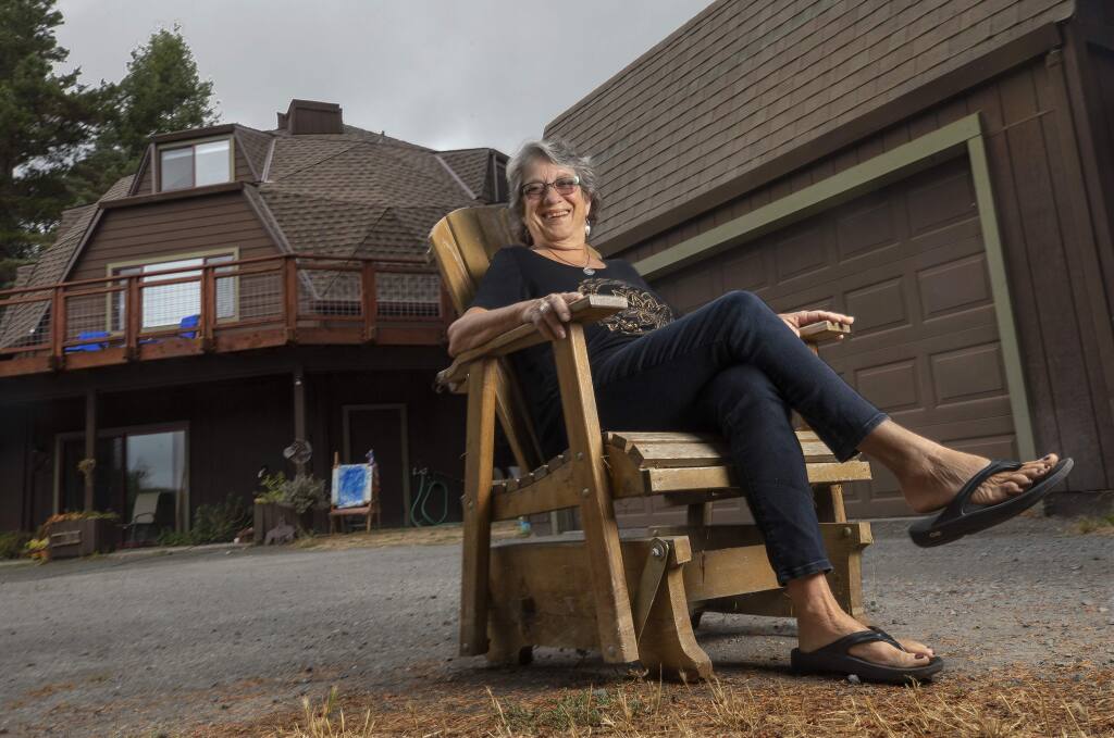 A recent county ordinance change allows Jennifer Mann to build a granny-unit above her garage on her rural property west of Sebastopol she shares with her kids and grandkids. (photo by John Burgess/The Press Democrat)