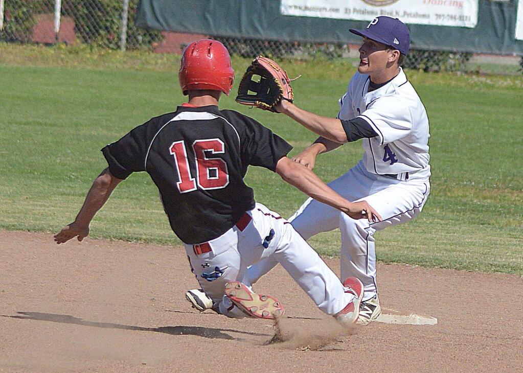 (SUMNER FOWLER/FOR THE ARGUS-COURIER)Montgomery's Travis Sheffer bares down on Petaluma second baseman Drake Paretti in the game that eliminated Petaluma from the NCS playoffs.
