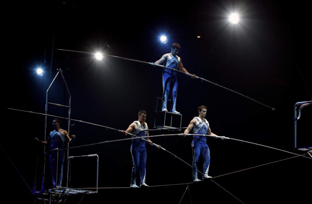 A Ringling Bros. and Barnum & Bailey high wire act performs during a show Saturday, Jan. 14, 2017, in Orlando, Fla. The Ringling Bros. and Barnum & Bailey Circus will end the 'The Greatest Show on Earth' in May, following a 146-year run of performances. Kenneth Feld, the chairman and CEO of Feld Entertainment, which owns the circus, told The Associated Press, declining attendance combined with high operating costs are among the reasons for closing. (AP Photo/Chris O'Meara)