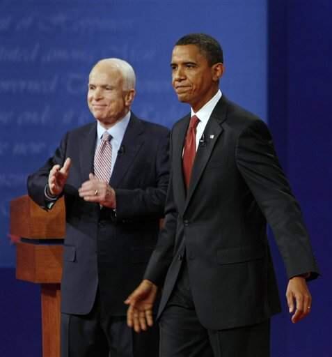 Republican presidential candidate, Sen. John McCain, R-Ariz., and Democratic presidential candidate, Sen. Barack Obama, D-Ill., join each other on stage at the conclusion of the presidential debate at the University of Mississippi in Oxford, Miss. Friday, Sept. 26, 2008. (AP Photo/Gerald Herbert)