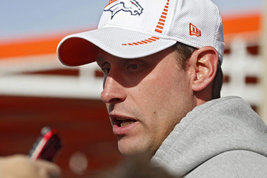 Broncos offensive coordinator Adam Gase led the league's No. 1-ranked offense in 2013 and the No. 4-ranked offense in 2014. (Ed Andrieski / Associated Press)