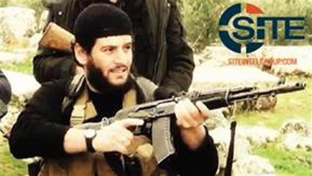 This undated militant image provided by SITE Intel Group shows Abu Muhammed al-Adnani, the Islamic State militant group's spokesman who IS say was 'martyred' in northern Syria. The IS-run Aamaq news agency said Tuesday, Aug. 30, 2016 that al-Adnani was 'martyred while surveying the operations to repel the military campaigns against Aleppo,' without providing further details. (SITE Intel Group via AP)