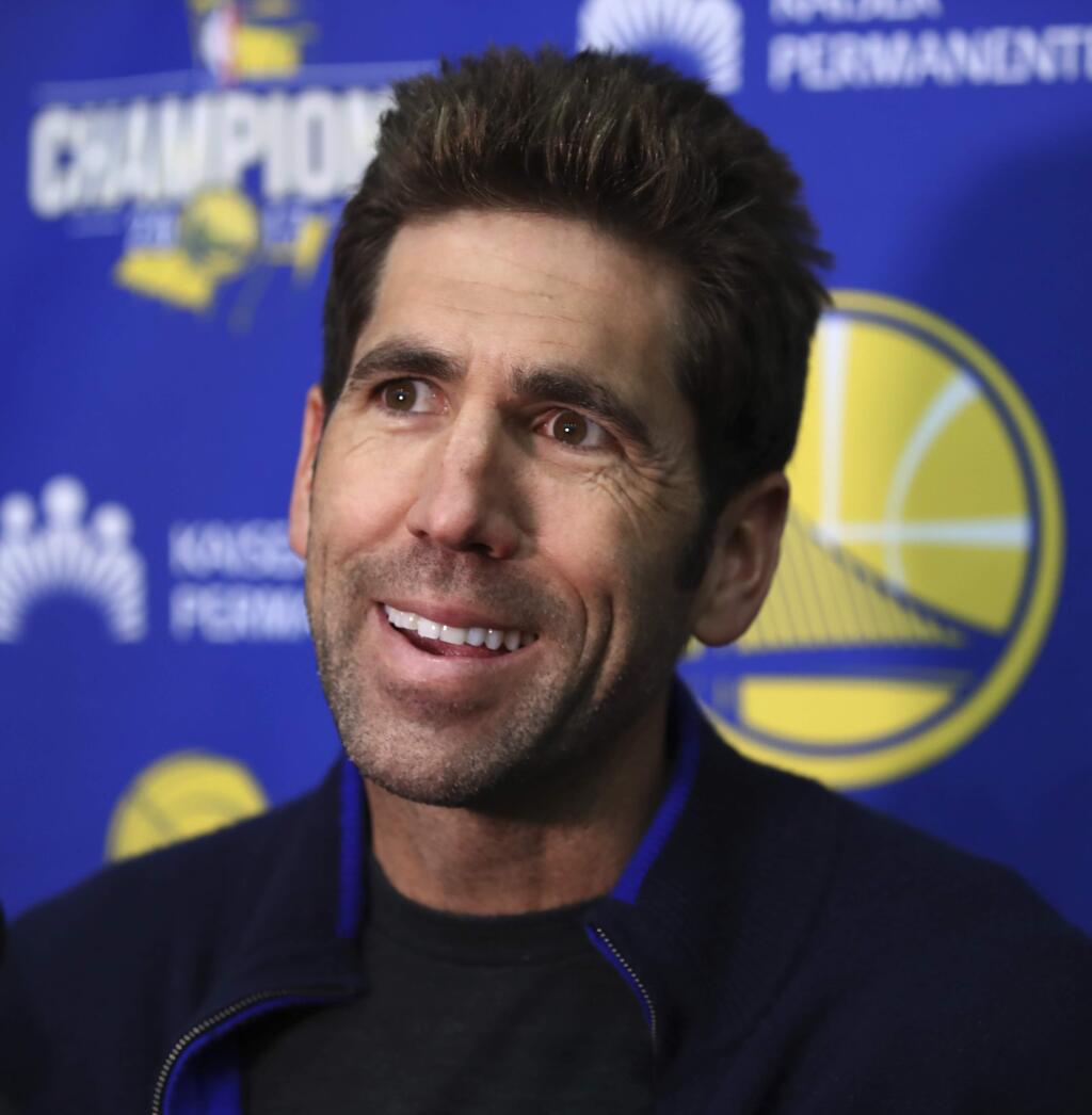 Golden State Warriors General Manager Bob Myers smiles during a media conference Monday, June 11, 2018, in Oakland, Calif. (AP Photo/Ben Margot)