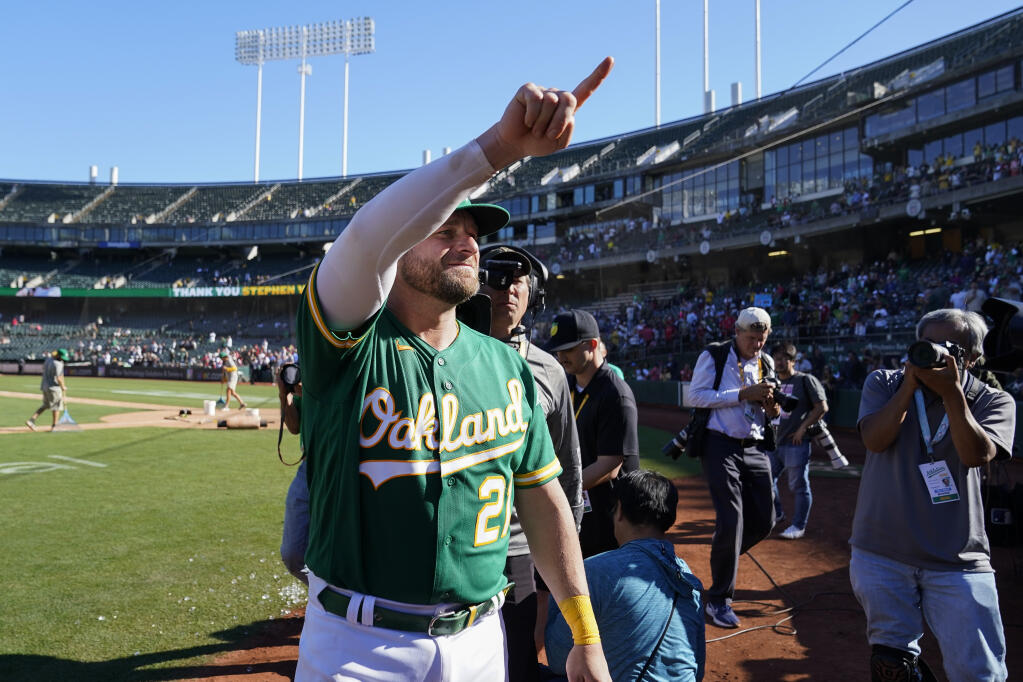 The Athletics’ Stephen Vogt exits the field after the team’s 3-2 victory over the Los Angeles Angels Wednesday in Oakland. (Godofredo A. Vásquez / ASSOCIATED PRESS)