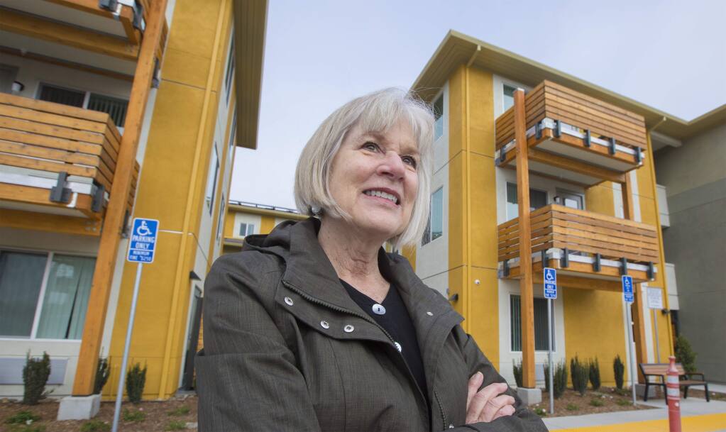 Ann Scarff stands outside Celestina Gardens, a senior affordable housing project on Highway 12 in Sonoma Valley. MidPen Housing completed the project in 2020. (Photo by Robbi Pengelly/Index-Tribune)