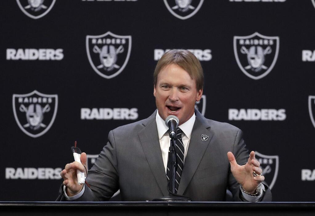 Oakland Raiders new head coach Jon Gruden answers questions during a press conference Tuesday, Jan. 9, 2018, in Alameda. (AP Photo/Marcio Jose Sanchez)