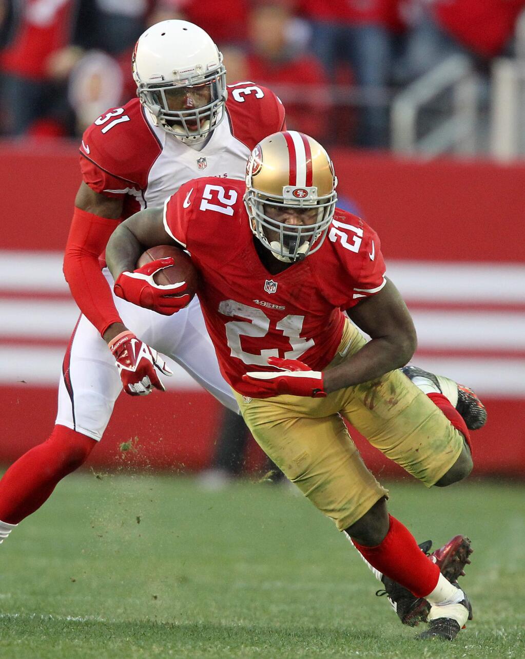 Frank Gore ran for 144 yards on Sunday including this 24 yard run in the 4th quarter. The San Francisco 49ers beat the Arizona Cardinals, 20-17, on December 28, 2014. (Photo by John Burgess/The Press Democrat)