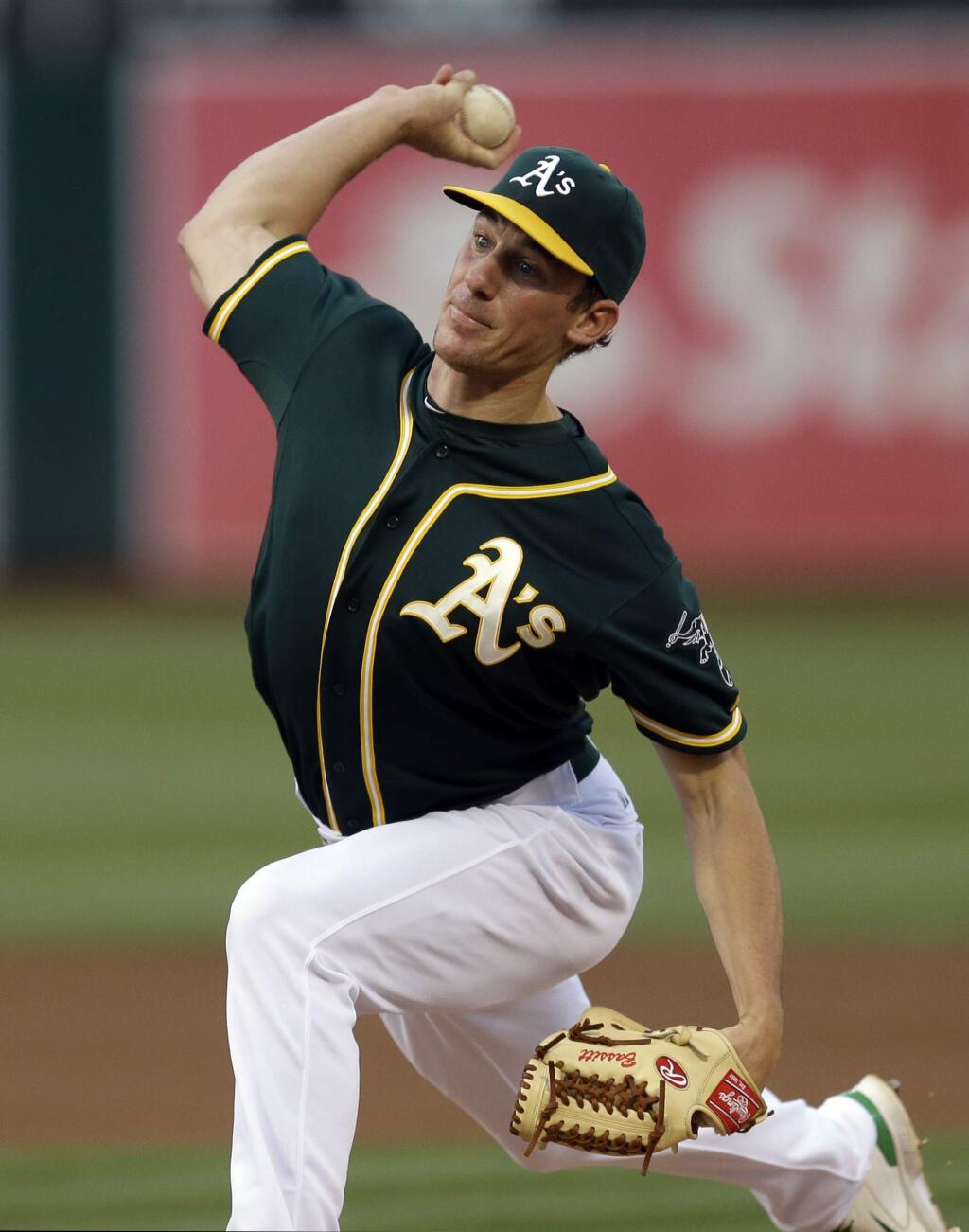 Oakland Athletics' Chris Bassitt works against the Colorado Rockies during the first inning of a baseball game Tuesday, June 30, 2015, in Oakland, Calif. (AP Photo/Ben Margot)