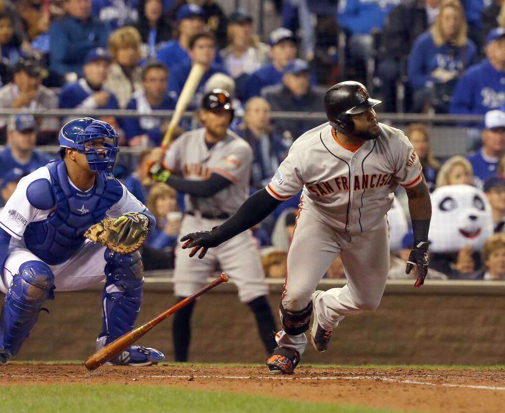 Giants Pablo Sandoval singles in the fourth inning during Game 7 of the World Series in Kansas City, Wednesday Oct. 29. (Christopher Chung / Press Democrat)