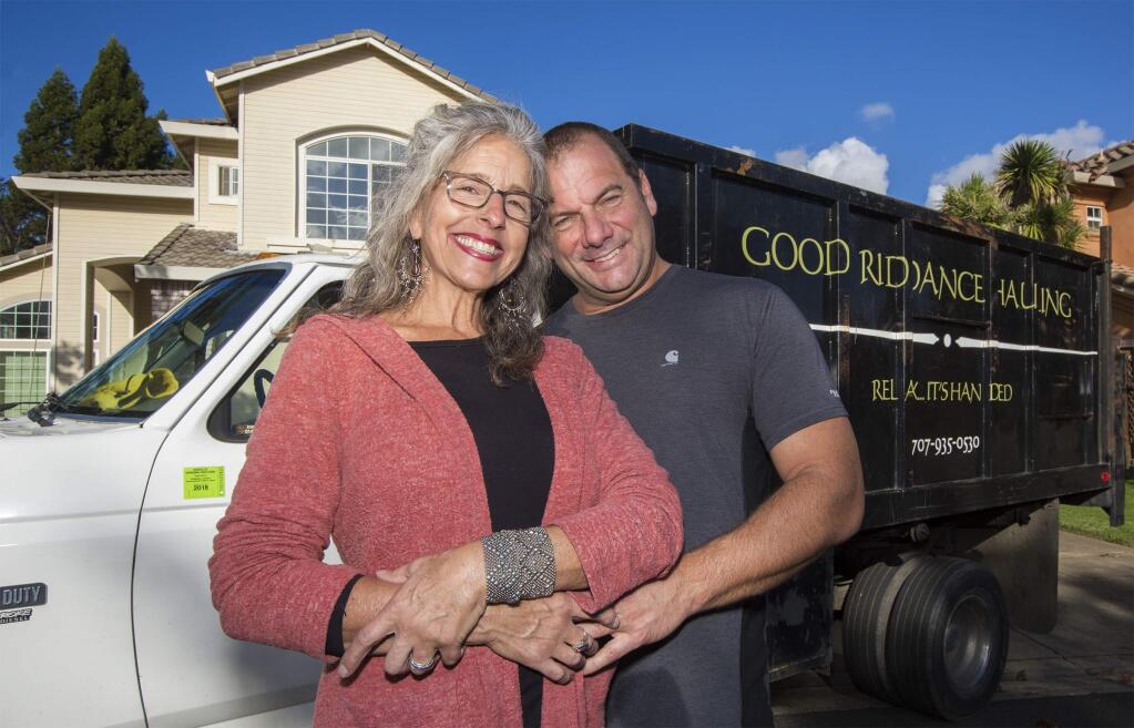 Leslie Boutell and Simon Purshouse, owners of Good Riddance Hauling. (Photo by Robbi Pengelly/Index-Tribune)