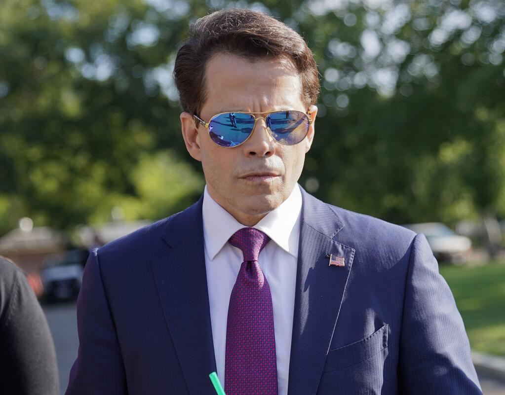 FILE - In this July 25, 2017, file photo, White House communications director Anthony Scaramucci walks back to the West Wing of the White House in Washington. Scaramucci claimed in a tweet on Aug. 9, 2017, the profanity-laced phone call that preceded his ouster from the White House was recorded by a reporter without his permission. (AP Photo/Pablo Martinez Monsivais, File)