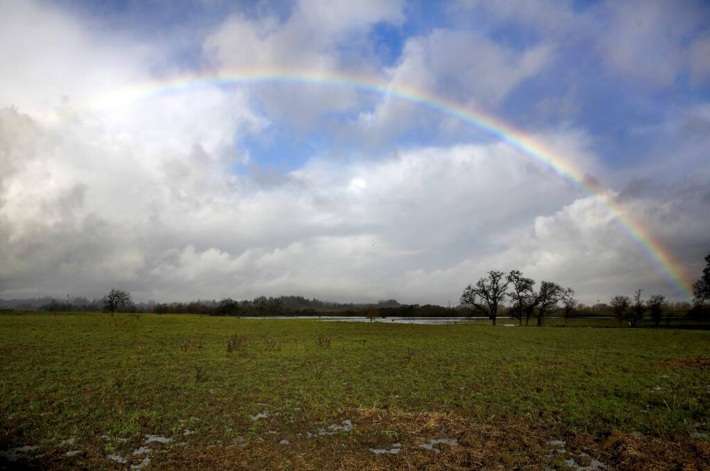 A rainbow appears during intermittent rain showers near Rutherdale Rd in Santa Rosa, on Thursday, January 19, 2017. (BETH SCHLANKER/ The Press Democrat)