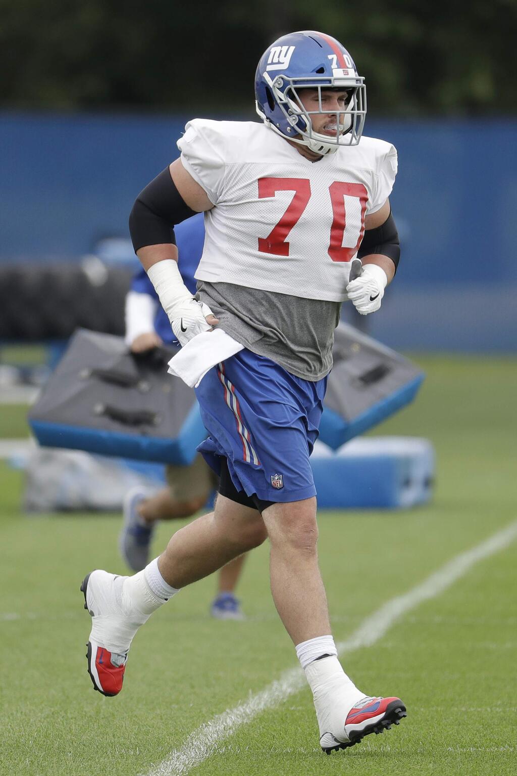 New York Giants center Weston Richburg jogs during training camp, Saturday, July 29, 2017, in East Rutherford, N.J. (AP Photo/Julio Cortez)