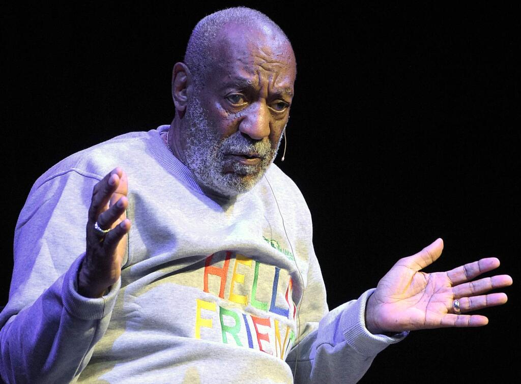 FILE - In this Nov. 21, 2014 file photo, comedian Bill Cosby performs during a show at the Maxwell C. King Center for the Performing Arts in Melbourne, Fla. (AP Photo/Phelan M. Ebenhack, File)
