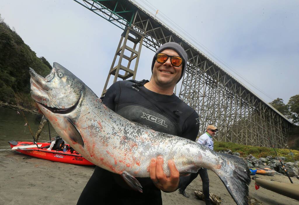 Stephen James caught the only salmon at the 2016 Albion Open kayak fishing tournament in Albion, CA. (JOHN BURGESS/The Press Democrat)