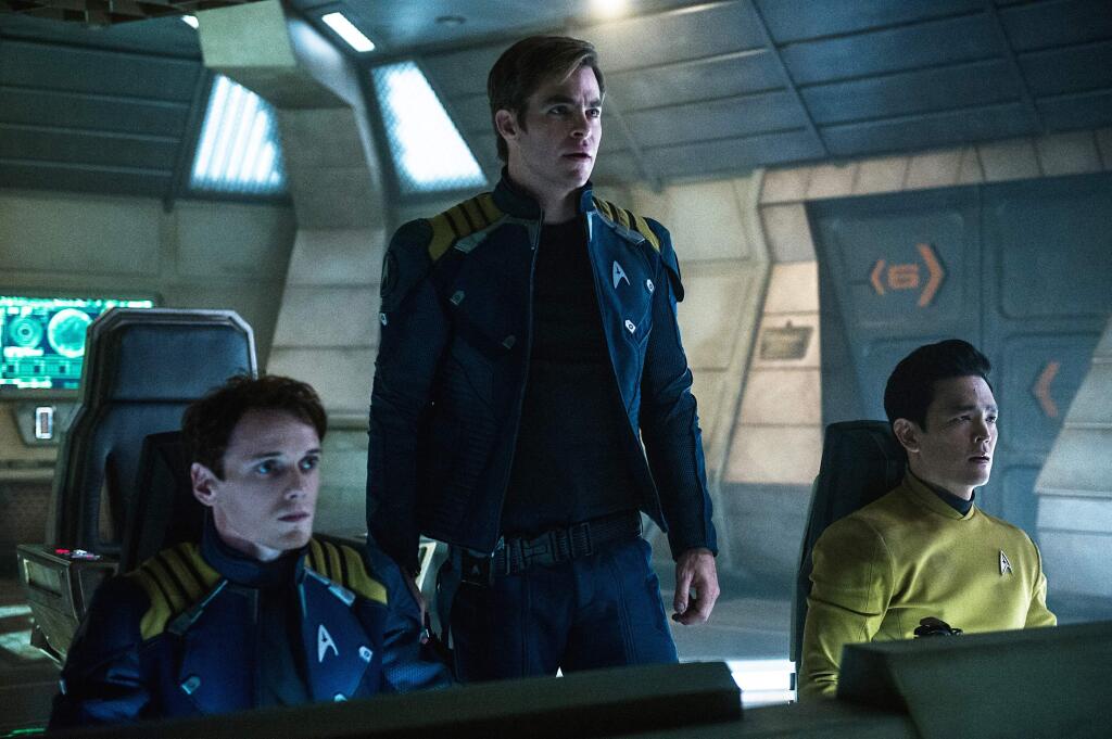 In this image released by Paramount Pictures, from left, Anton Yelchin, Chris Pine and John Cho appear in a scene from, 'Star Trek Beyond.' (Kimberley French/Paramount Pictures via AP)