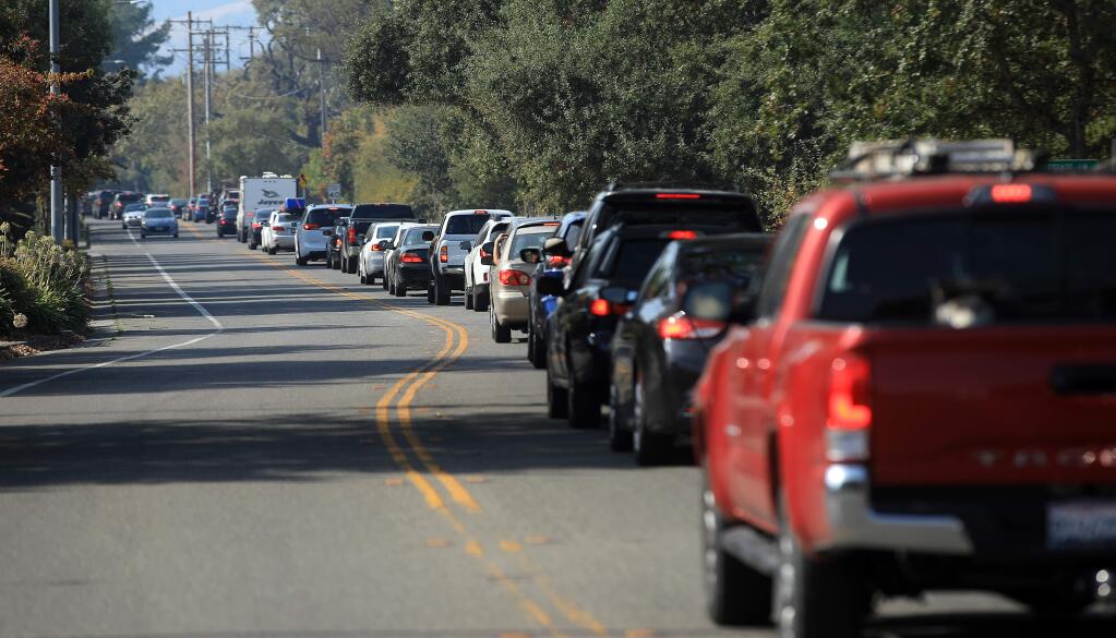 Arata Lane in Windsor is backed up as residents evacuate from the threat of the Kincade fire, Saturday Oct 26, 2019. (Kent Porter / The Press Democrat) 2019