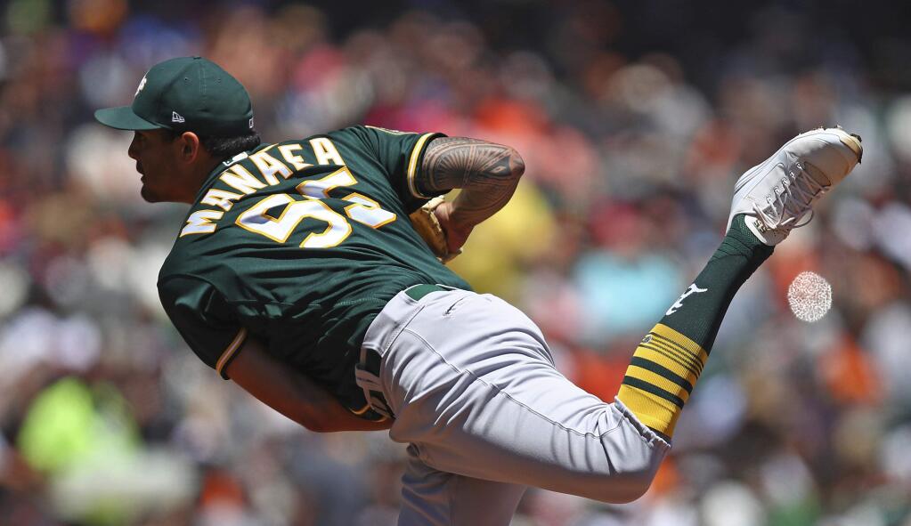 Oakland Athletics pitcher Sean Manaea works against the San Francisco Giants in the first inning of a baseball game Sunday, July 15, 2018, in San Francisco. (AP Photo/Ben Margot)