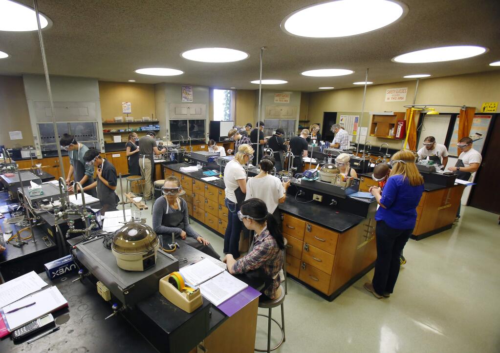 Students crowd into a chemistry lab in Bech Hall at Santa Rosa Junior College, which are in need of upgrades to support 21st century science education, administrators said. (Conner Jay/The Press Democrat)