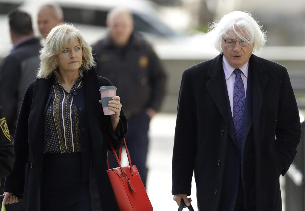 Attorneys Kathleen Bliss, left, and Tom Mesereau arrive for Bill Cosby's sexual assault trial, Tuesday, April 17, 2018, at the Montgomery County Courthouse in Norristown, Pa. (AP Photo/Matt Slocum)