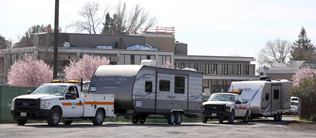 FEMA trailers arrive at a parking lot on Fiscal Drive in the Sonoma County complex in Santa Rosa on Thursday, February 27, 2020. (BETH SCHLANKER/ The Press Democrat)