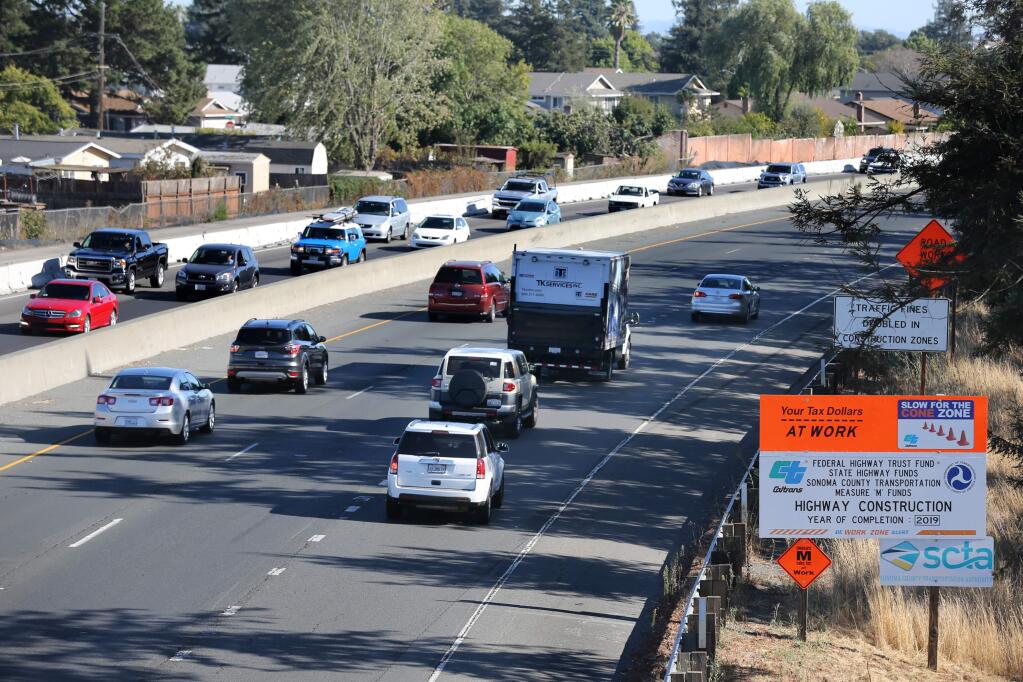 Vehicles drive along Highway 101 between E. Washington and Lakeville streets in Petaluma on Wednesday, Oct. 2, 2019. (BETH SCHLANKER/The Press Democrat)