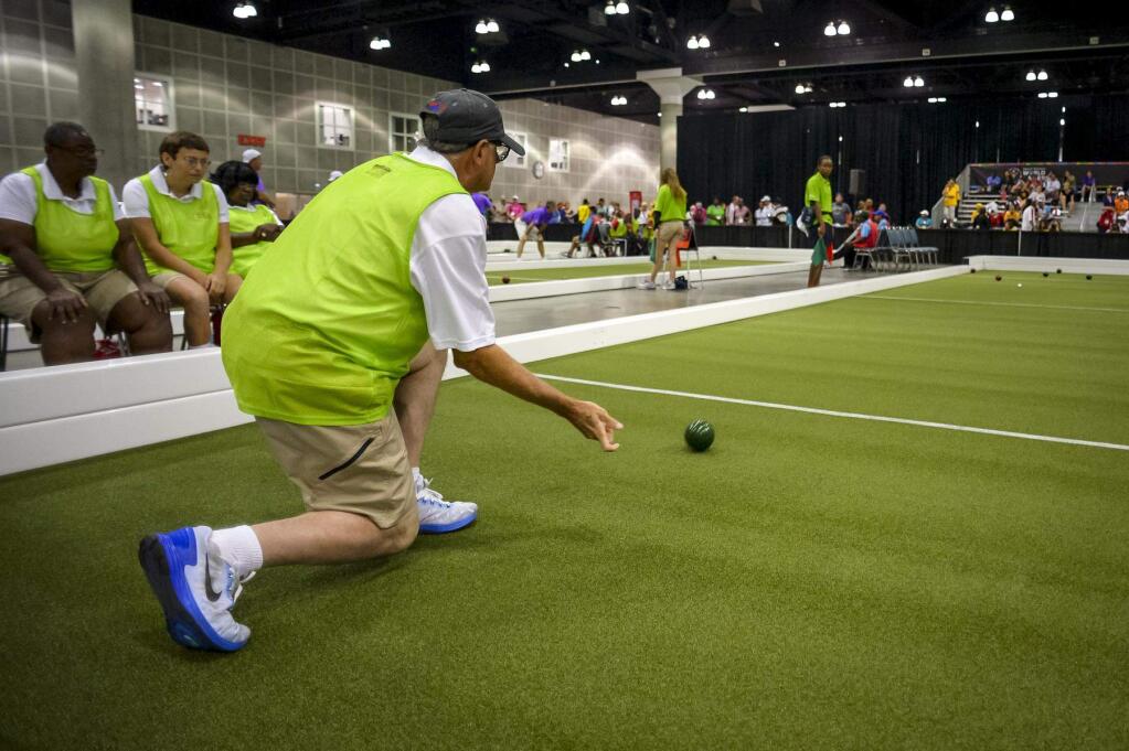 Kenneth Skinner of the United States makes a shot during Bocce team play at the Special Olympics this week in Los Angeles. (DAVID CRANE / Los Angeles Daily News)