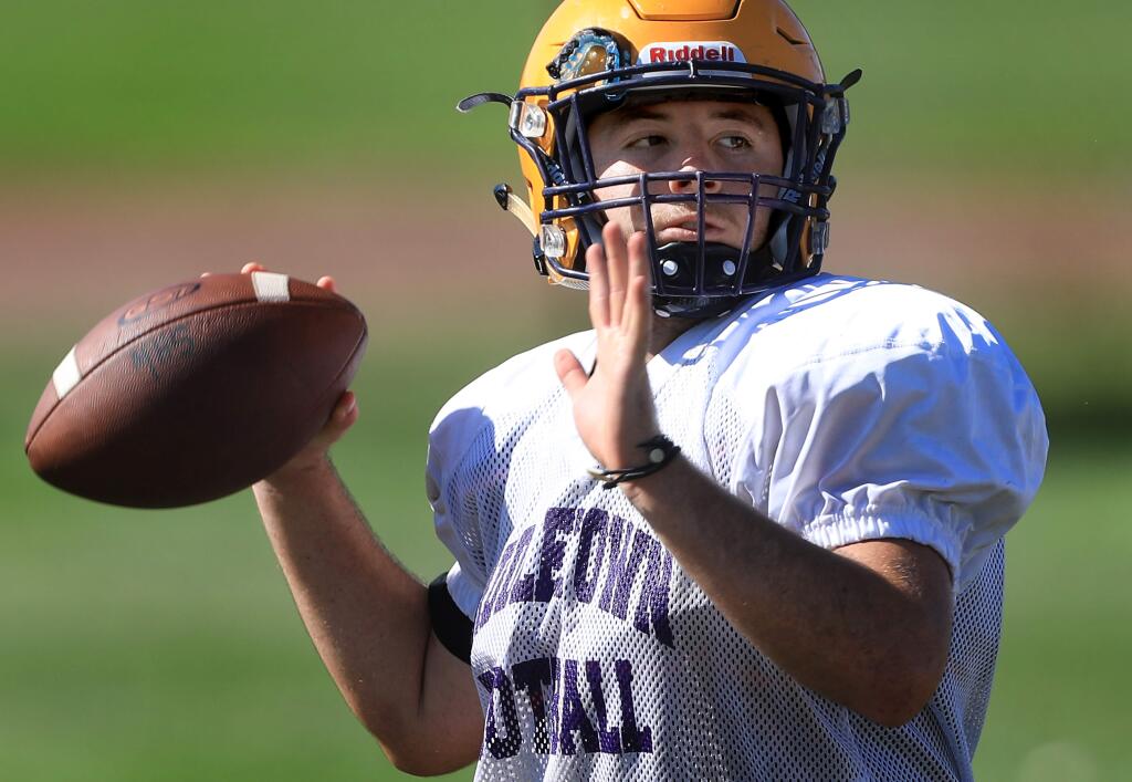 Middletown High School's quarterback Isaac Perez, Wednesday, Aug. 14, 2019 in Middletown. (Kent Porter / The Press Democrat)